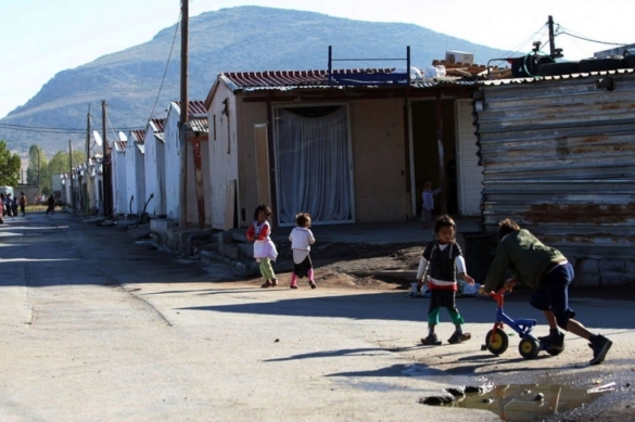 Roma children play next to a Roma settlement in Farsala central Greece 2470280 Roma children play next to a Roma settlement in Farsala central Greece 2470280