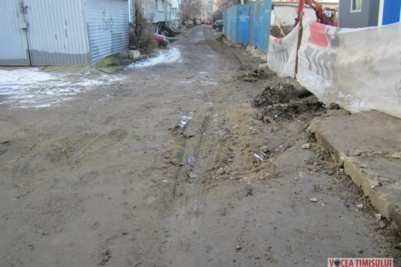 BĂTAIE DE JOC! Construiesc un bloc lipit de curtea școlii și-au umplut străzile de NOROI. Cât de aproape se ridică imobilul de un alt bloc FOTO/VIDEO