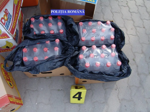 Și a umplut mașina cu sticle cu ALCOOL de contrabandă2 jpg