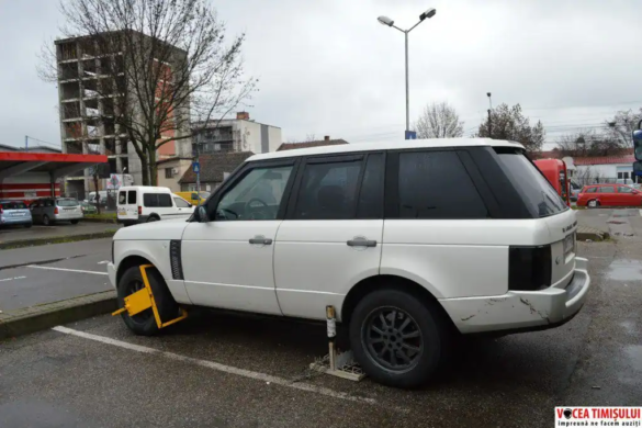 Un Range Rover, cu suspensia DISTRUSA de angajații firmei Îngerii Galbeni după ce a fost târât prin parcare
