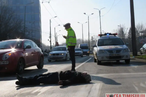 VIDEO Mort de beat, a picat din picioare in fata masinii de politie langa Iulius Mall Timisoara