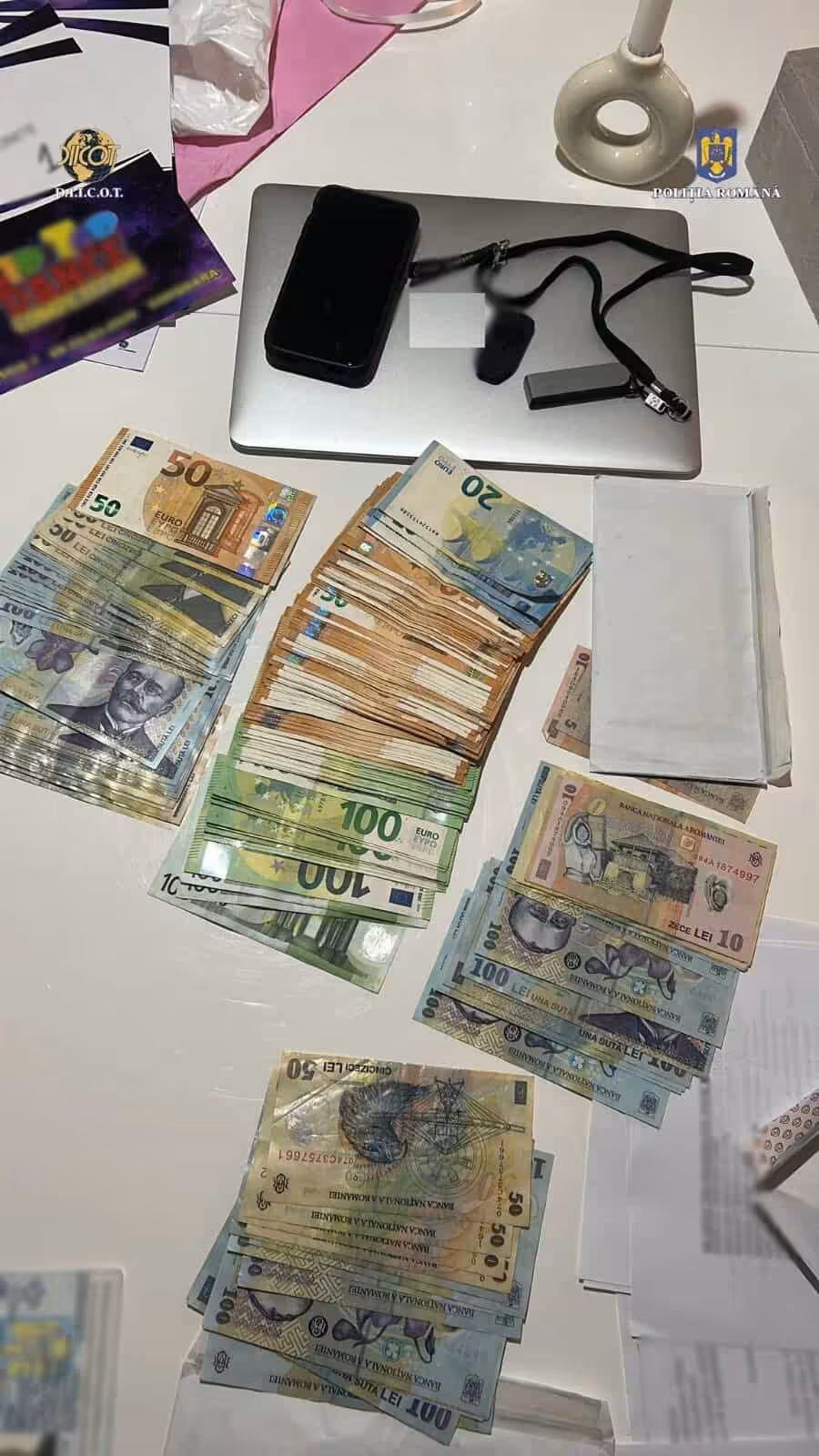 Afacere cu criptomonede și prejudiciu de 17 milioane de dolari: 66 de percheziții DIICOT în nouă județe și în Capitală